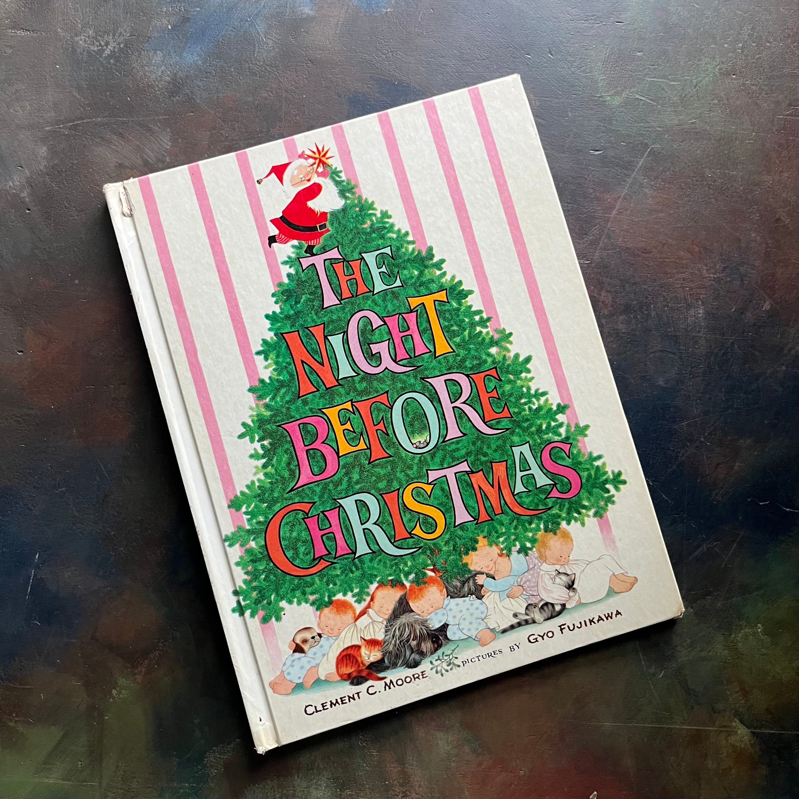 The Night Before Christmas written by Clement C. Moore with illustrations by Gyo Fujikawa illustrations-Grosset & Dunlap Publishers Edition-vintage children's Christmas picture book-view of the front cover
