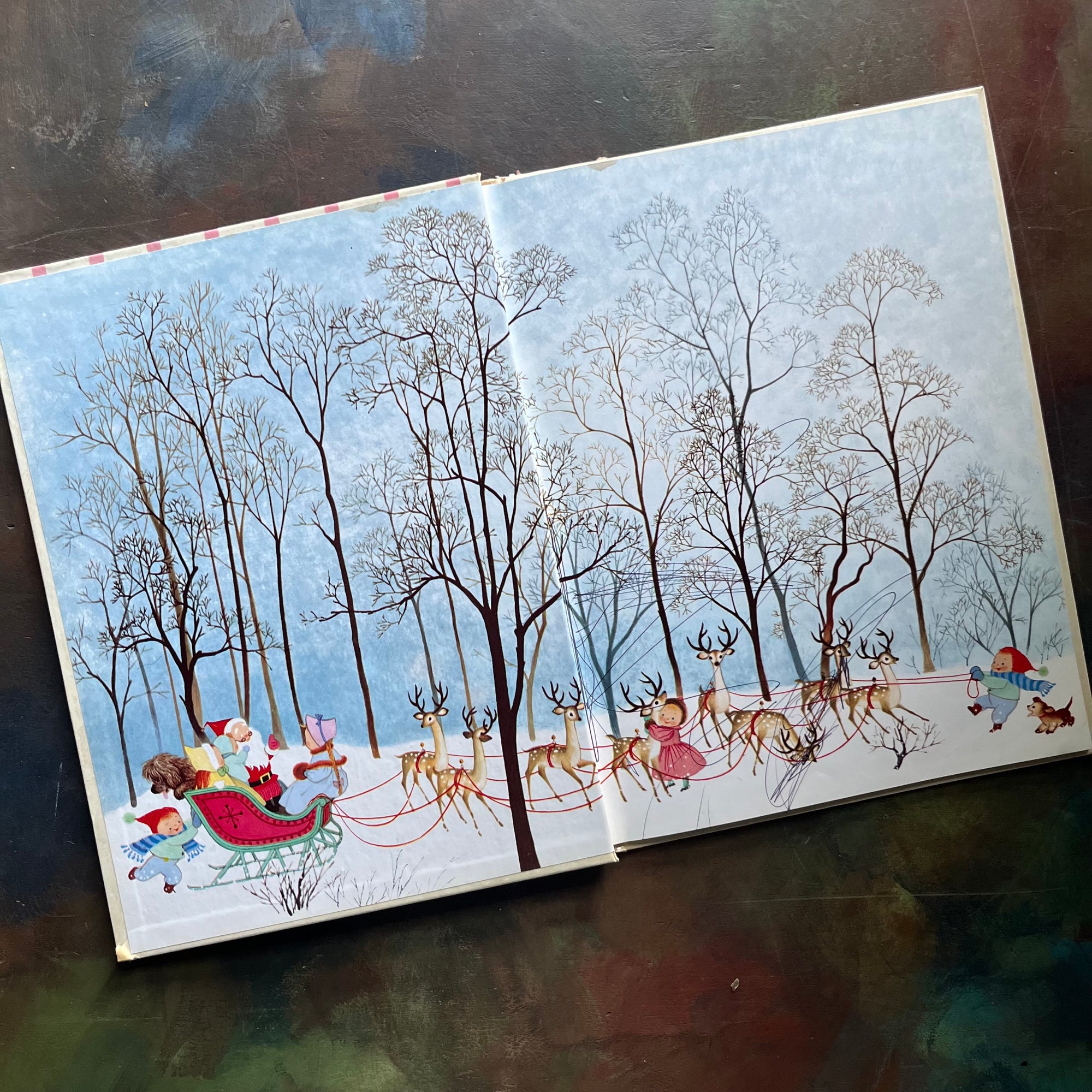 The Night Before Christmas written by Clement C. Moore with illustrations by Gyo Fujikawa illustrations-Grosset & Dunlap Publishers Edition-vintage children's Christmas picture book-view of the inside cover