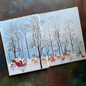 The Night Before Christmas written by Clement C. Moore with illustrations by Gyo Fujikawa illustrations-Grosset & Dunlap Publishers Edition-vintage children's Christmas picture book-view of the inside cover