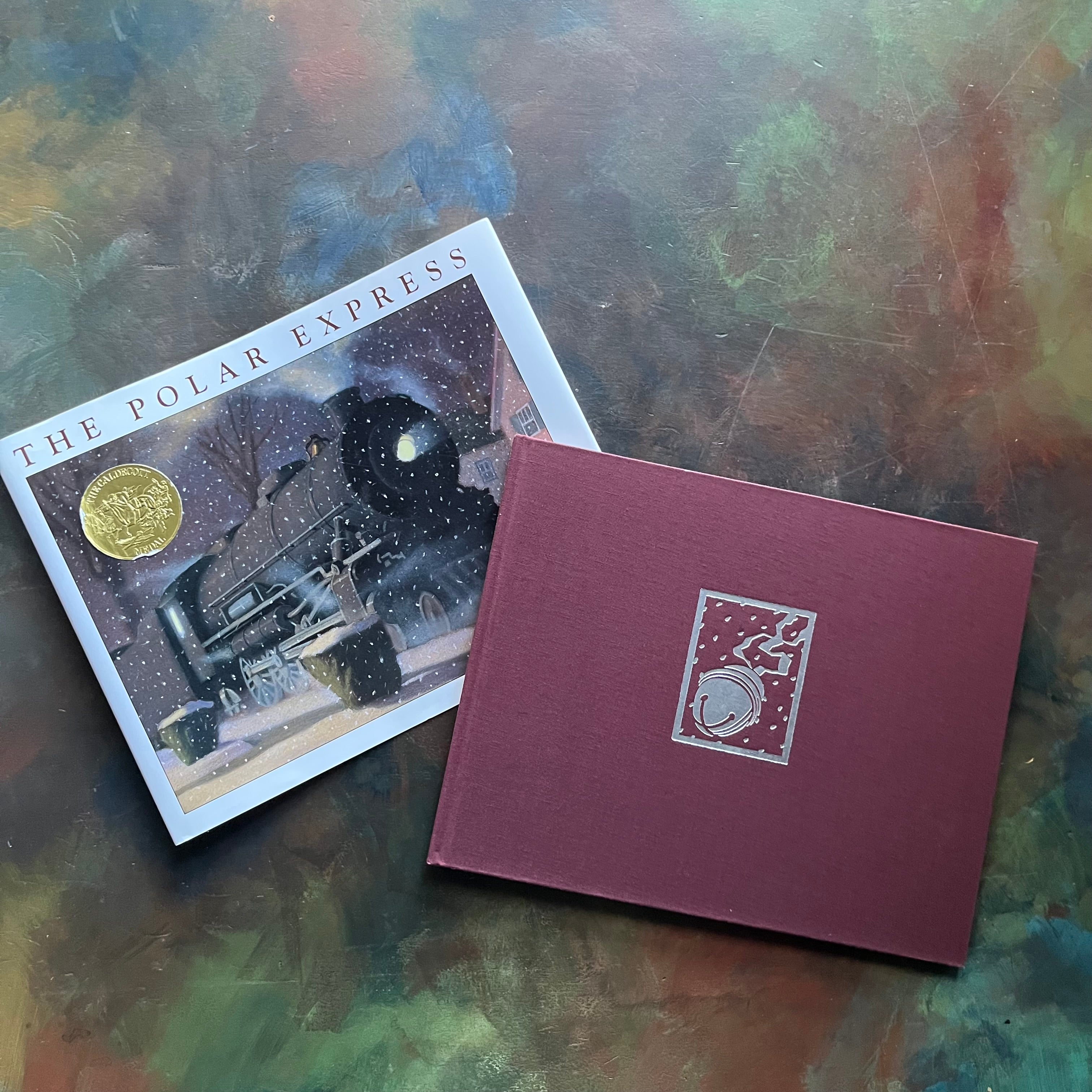 The Polar Express written and illustrated by Chris Van Allsburg-Caldecott award winning picture book-Christmas classic-view of the front cover with a sleigh bell embossed in silver color
