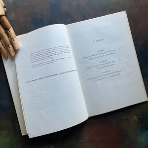The Pooh Story Book written by A.A. Milne with black and white and color illustrations by E.H. Shepard-classic picture book-read aloud favorite-a log cabin 100 book-view of the copyright and contents pages