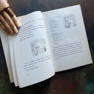 The Pooh Story Book written by A.A. Milne with black and white and color illustrations by E.H. Shepard-classic picture book-read aloud favorite-a log cabin 100 book-view of the black and white illustrations by E.H. Shepard