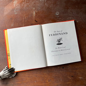 vintage children's picture book - The Story of Ferdinand written by Munro Leaf with illustrations by Robert Lawson - a 1964 Book Club Edition - view of the title page
