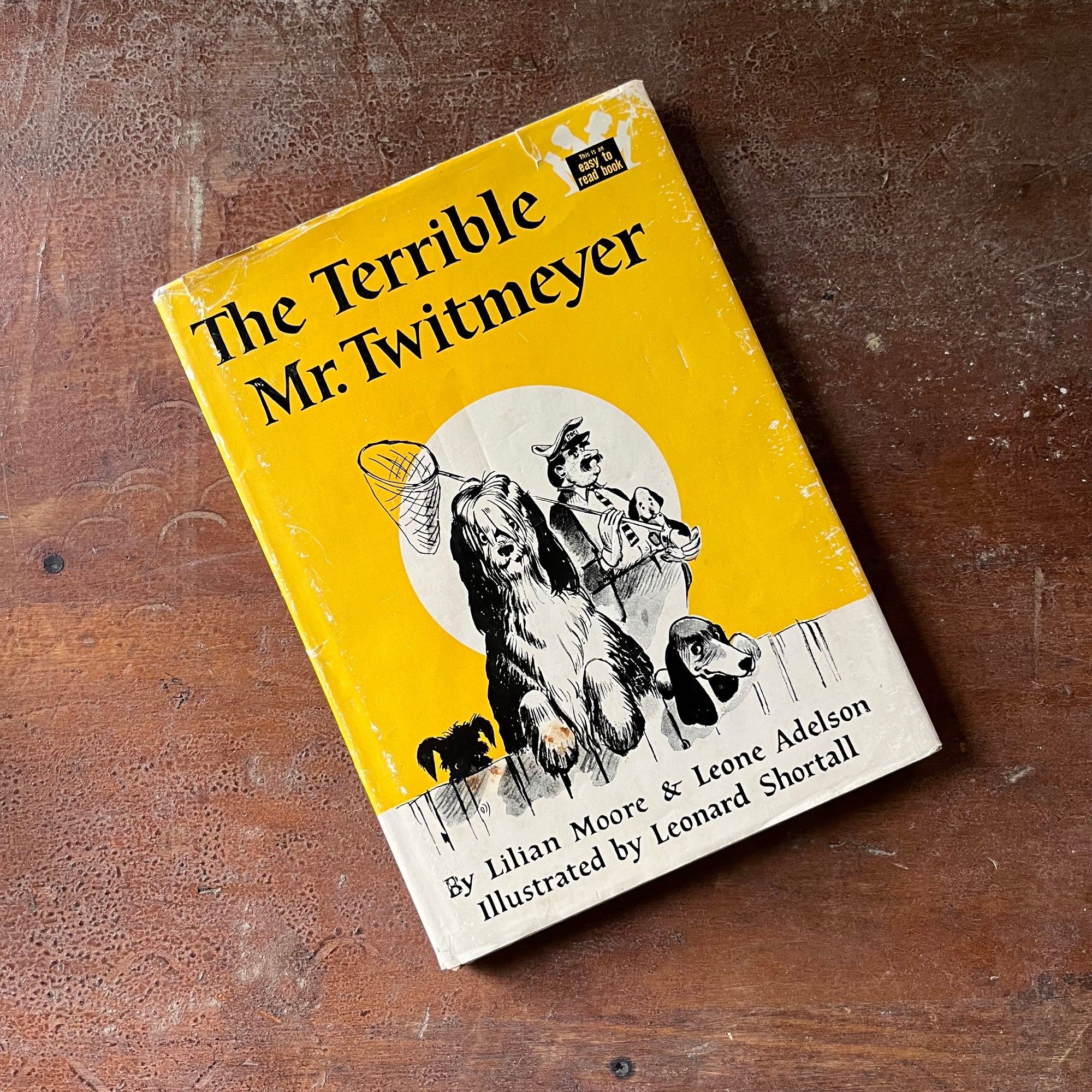 vintage children's chapter book, This is an Easy to Read Book, Step Into Reading - The Terrible Mr. Twitmeyer written by Lilian Moore & Leone Adelson with illustrations by Leonard Shortall - view of the dust jacket's front cover