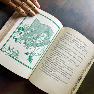 The Wizard of Oz by written by L. Frank Baum with illustrations by W. W. Denslow-1956 Edition-modern day fairy tale-classic children's literature-view of the illustrations in green and white
