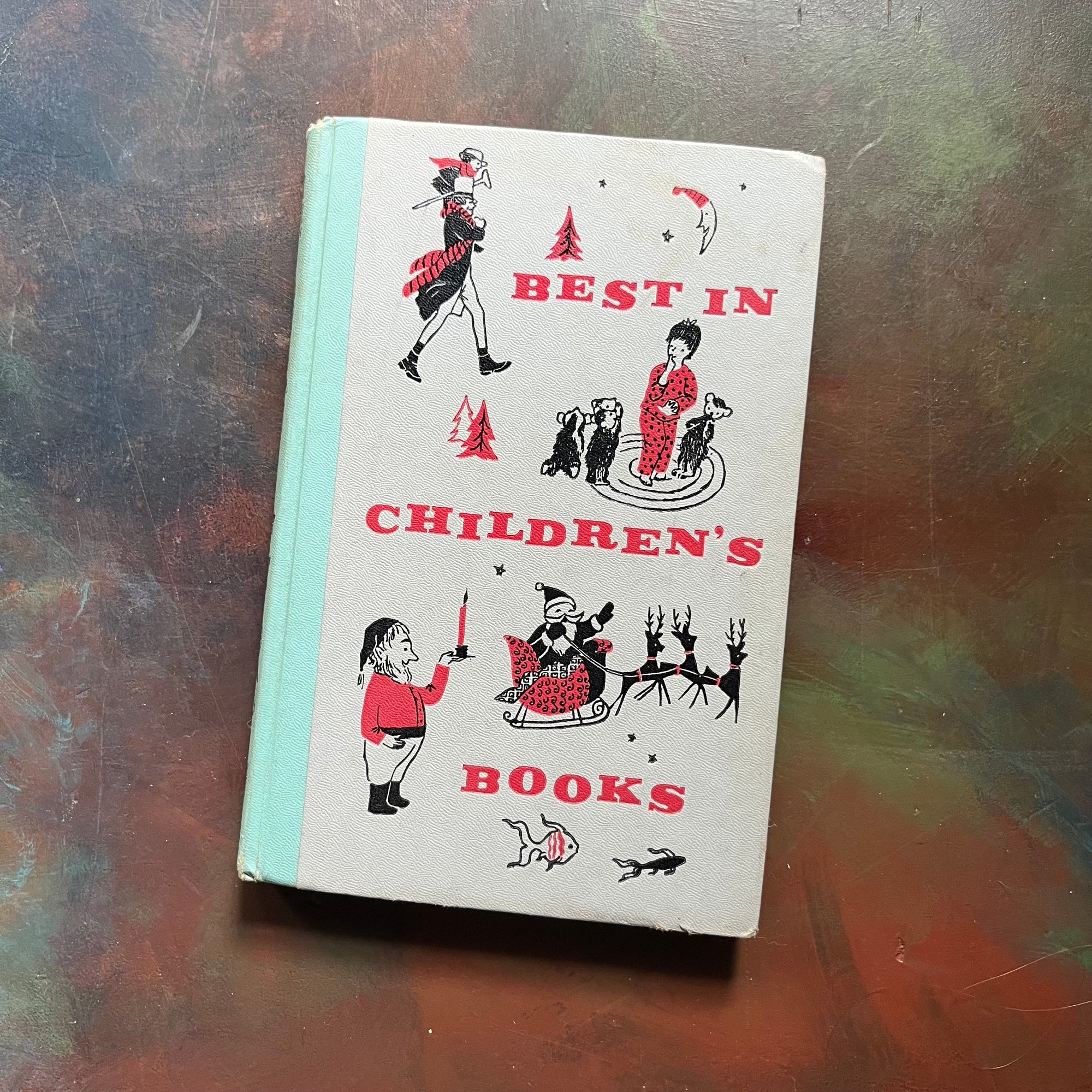 vintage children's book, children's book club book - Best in Children's Books 1957 Volume 4 - view of the embossed front cover with illustrations from inside the book