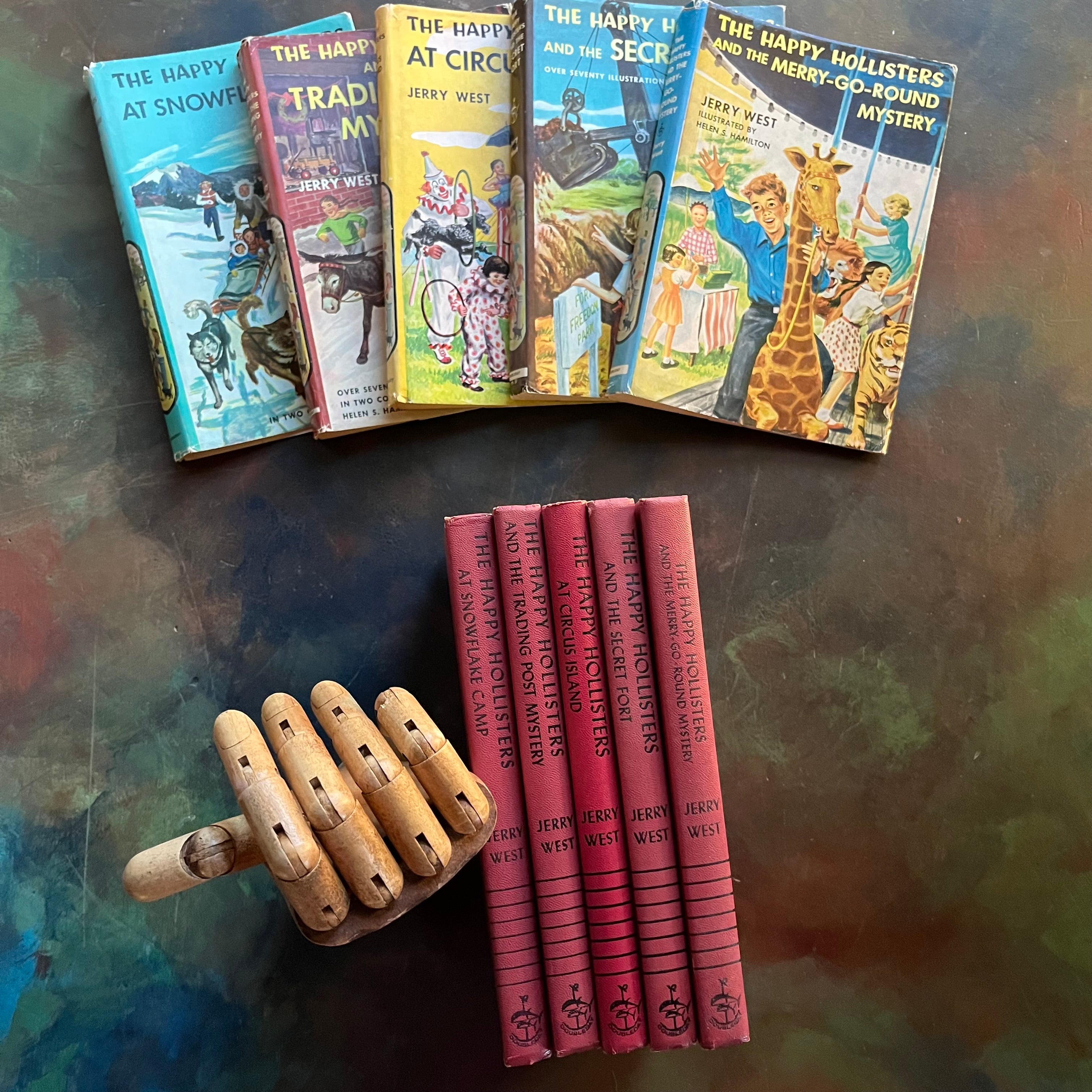 The Happy Hollisters Mystery Series by Jerry West-Starter Set Books 1-5-vintage children's mystery books-wholesome family reads-view of the spines in red & black