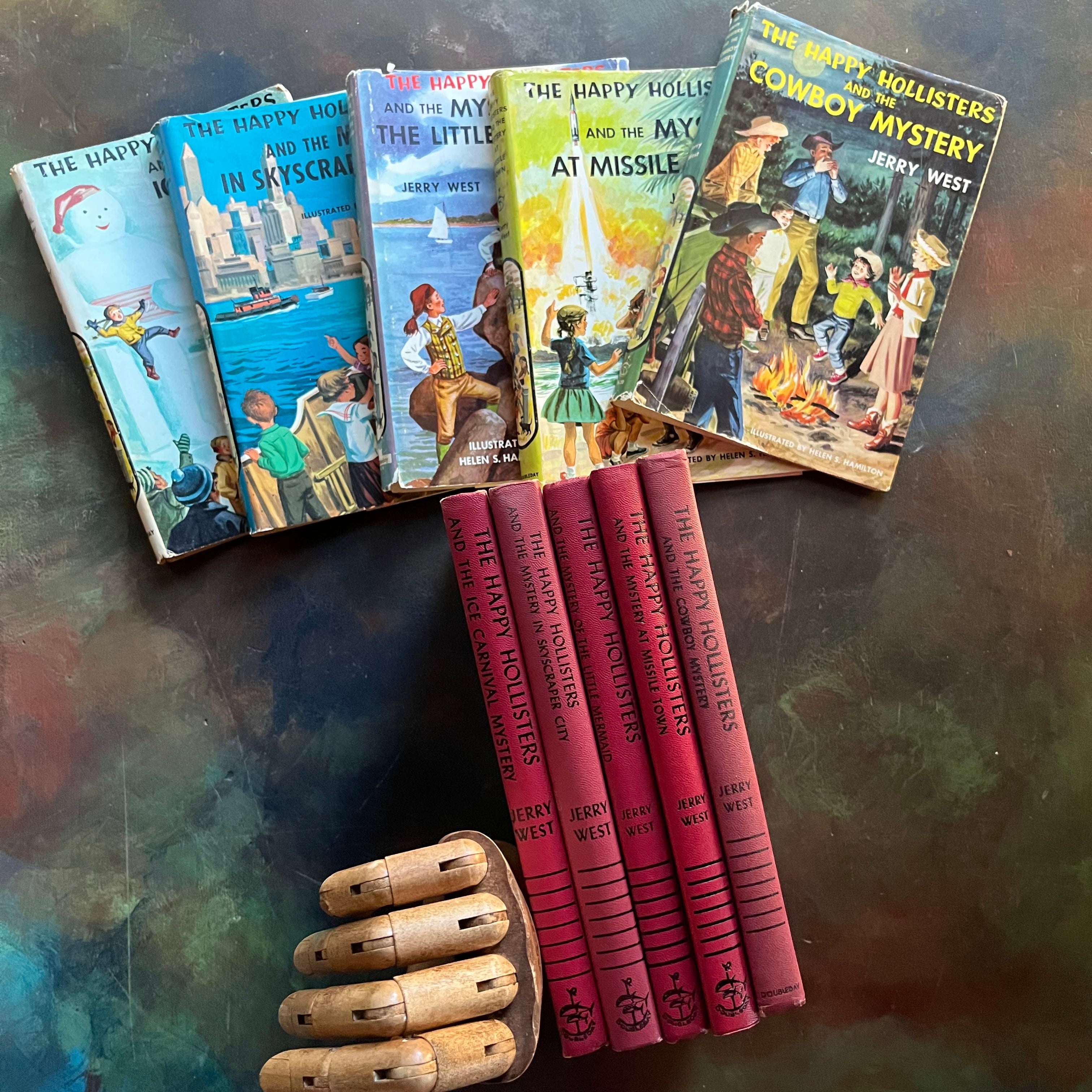The Happy Hollisters Mystery Series by Jerry West-Starter Set Books 1-5-vintage children's mystery books-wholesome family reads-view of the spines