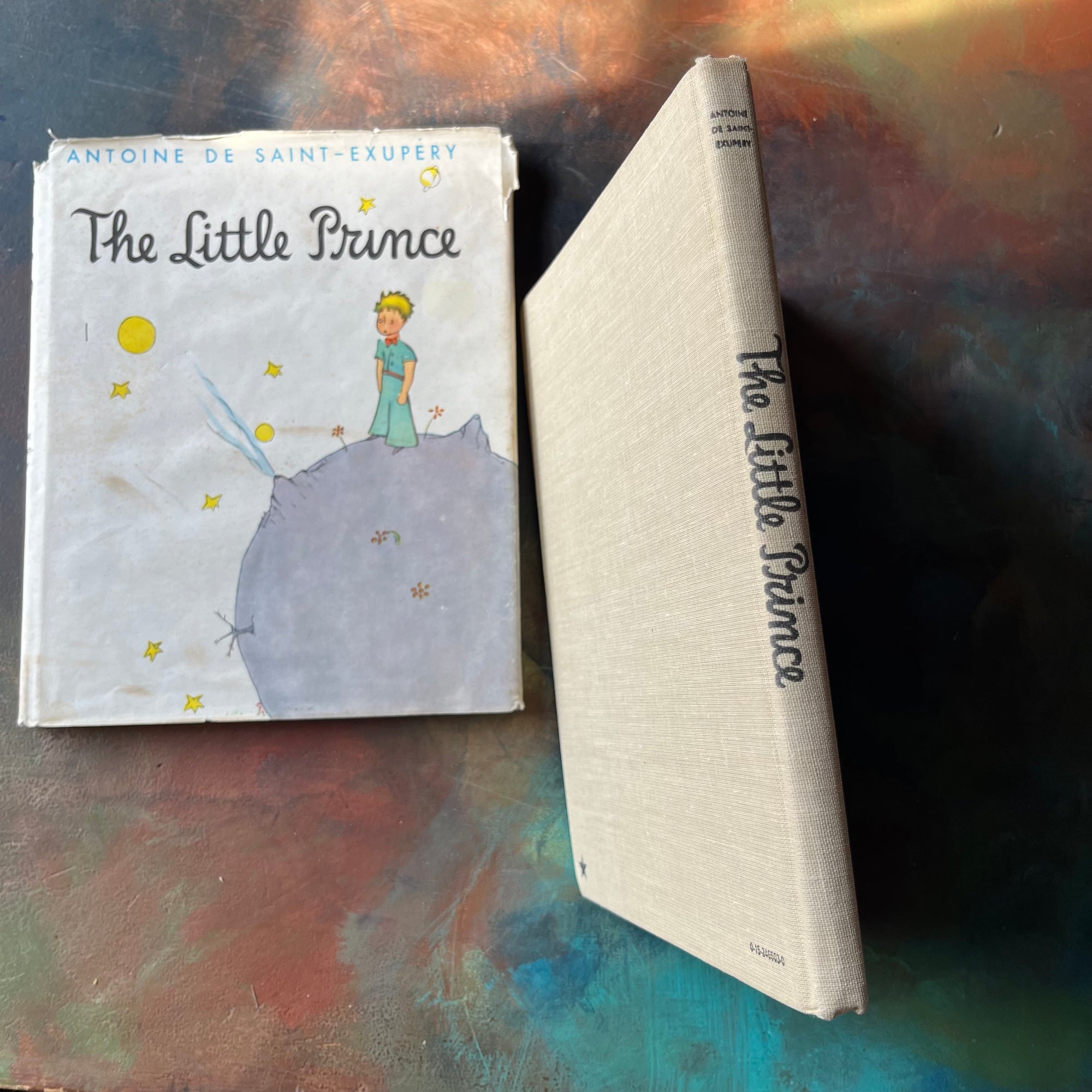 The Little Prince written & illustrated by Antoine De Saint-Exupery-vintage children's classic literature-vintage children's chapter book-view of the spine