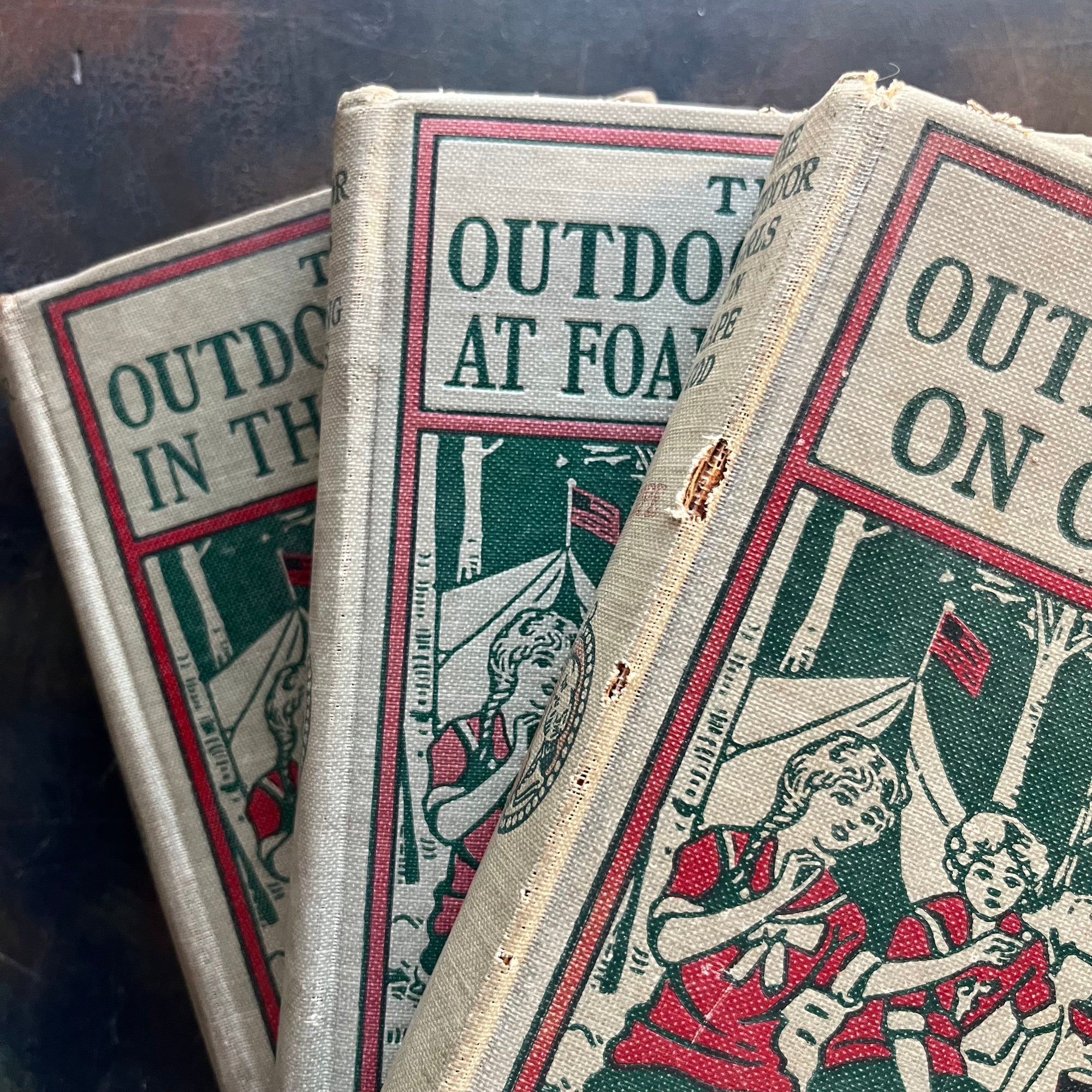 The Outdoor Girls on Cape Cod-The Outdoor Girls at Foaming Falls-The Outdoor Girls in the Saddle-Laura Lee Hope-vintage adventure books for girls-view of damage on the spine of one book