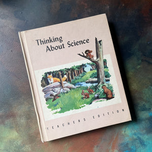 Thinking About Science Teacher's Edition-view of the front cover with an illustration of woodland creatures in the middle with title at top & "teacher's edition" at the bottom