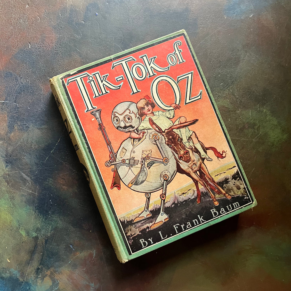 Tik-Tok of Oz written by L. Frank Baum with illustrations by John R. Neill-1914 Edition-modern day fairy tale-classic children's literature-vintage children's chapter book-view of the front cover