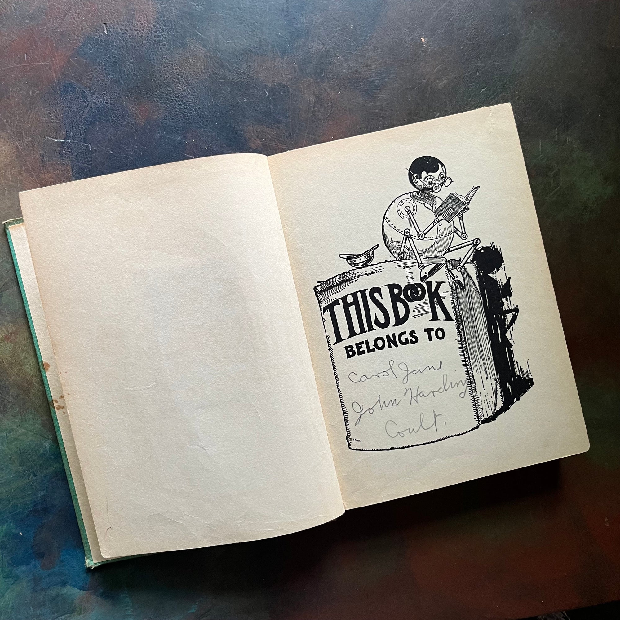 Tik-Tok of Oz written by L. Frank Baum with illustrations by John R. Neill-1914 Edition-modern day fairy tale-classic children's literature-vintage children's chapter book-view of the This Book Belongs to Page with names written in pencil noted