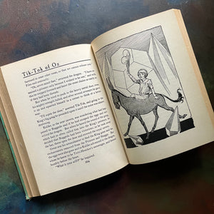 Tik-Tok of Oz written by L. Frank Baum with illustrations by John R. Neill-1914 Edition-modern day fairy tale-classic children's literature-vintage children's chapter book-view of the illustrations in black and white