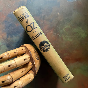 Tik-Tok of Oz written by L. Frank Baum with illustrations by John R. Neill-1914 Edition-modern day fairy tale-classic children's literature-vintage children's chapter book-view of the spine