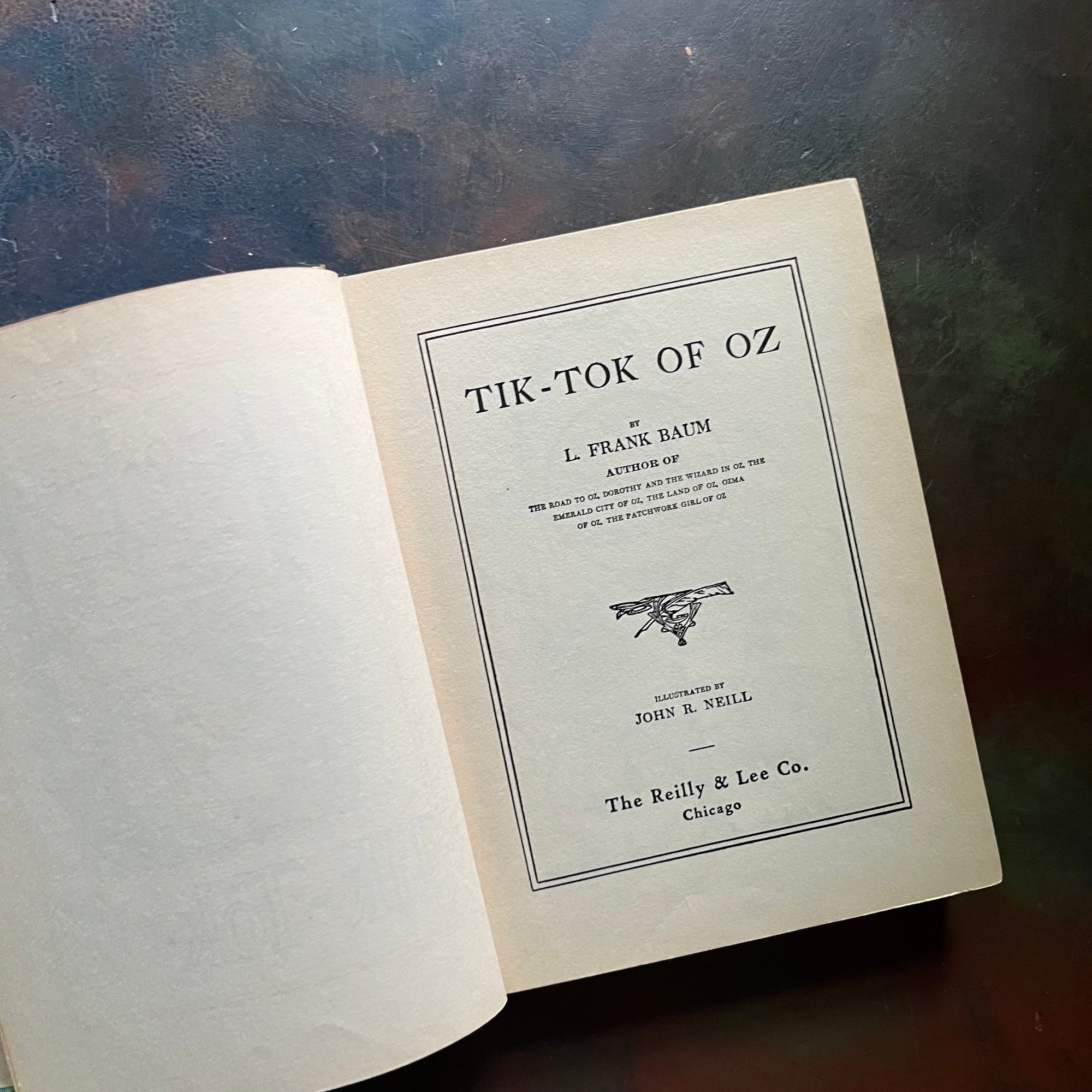 Tik-Tok of Oz written by L. Frank Baum with illustrations by John R. Neill-1914 Edition-modern day fairy tale-classic children's literature-vintage children's chapter book-view of the title page