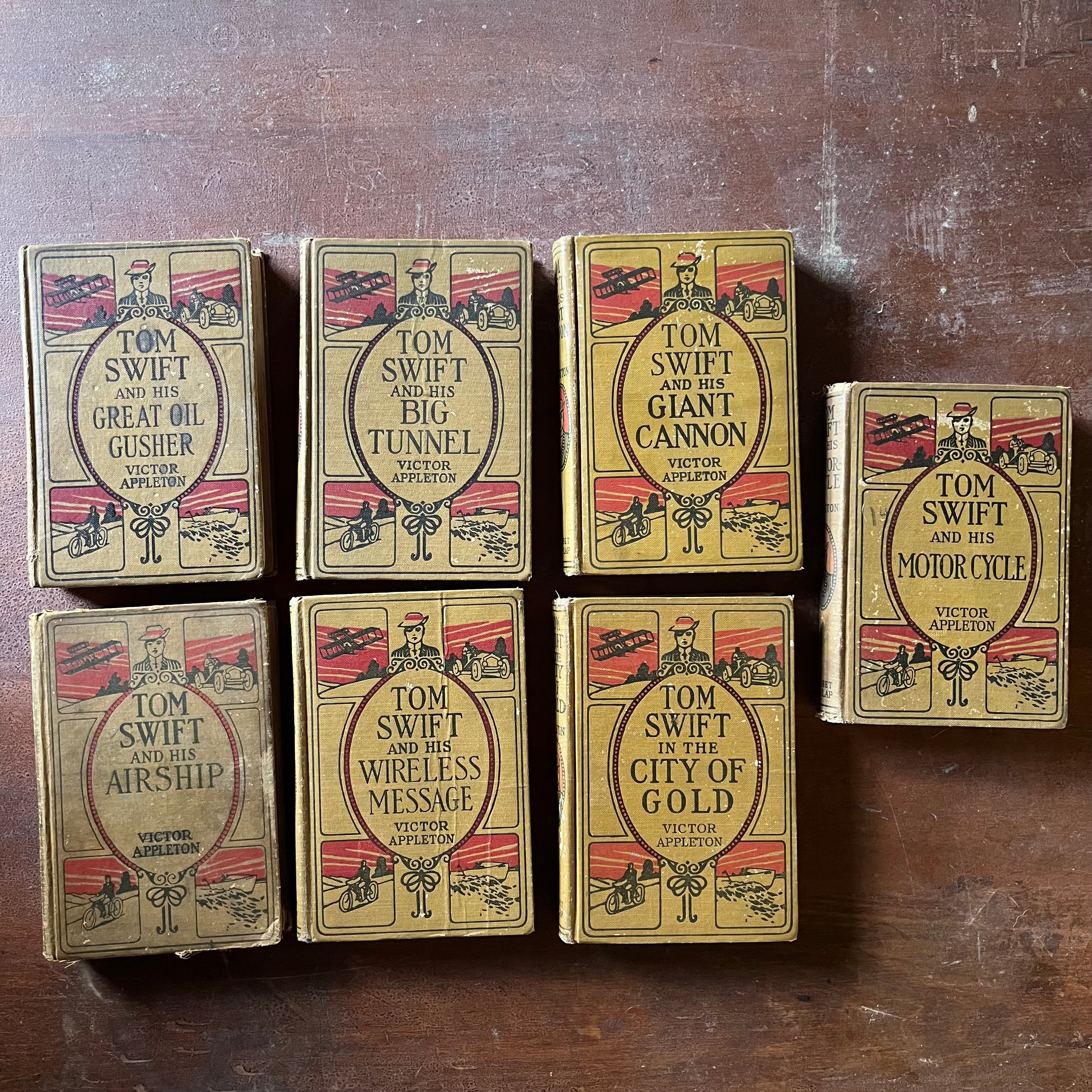 antique children's chapter books, adventure books for boys - Tom Swift Adventure Books Set of 7 written by Victor Appleton - view of the embossed front covers