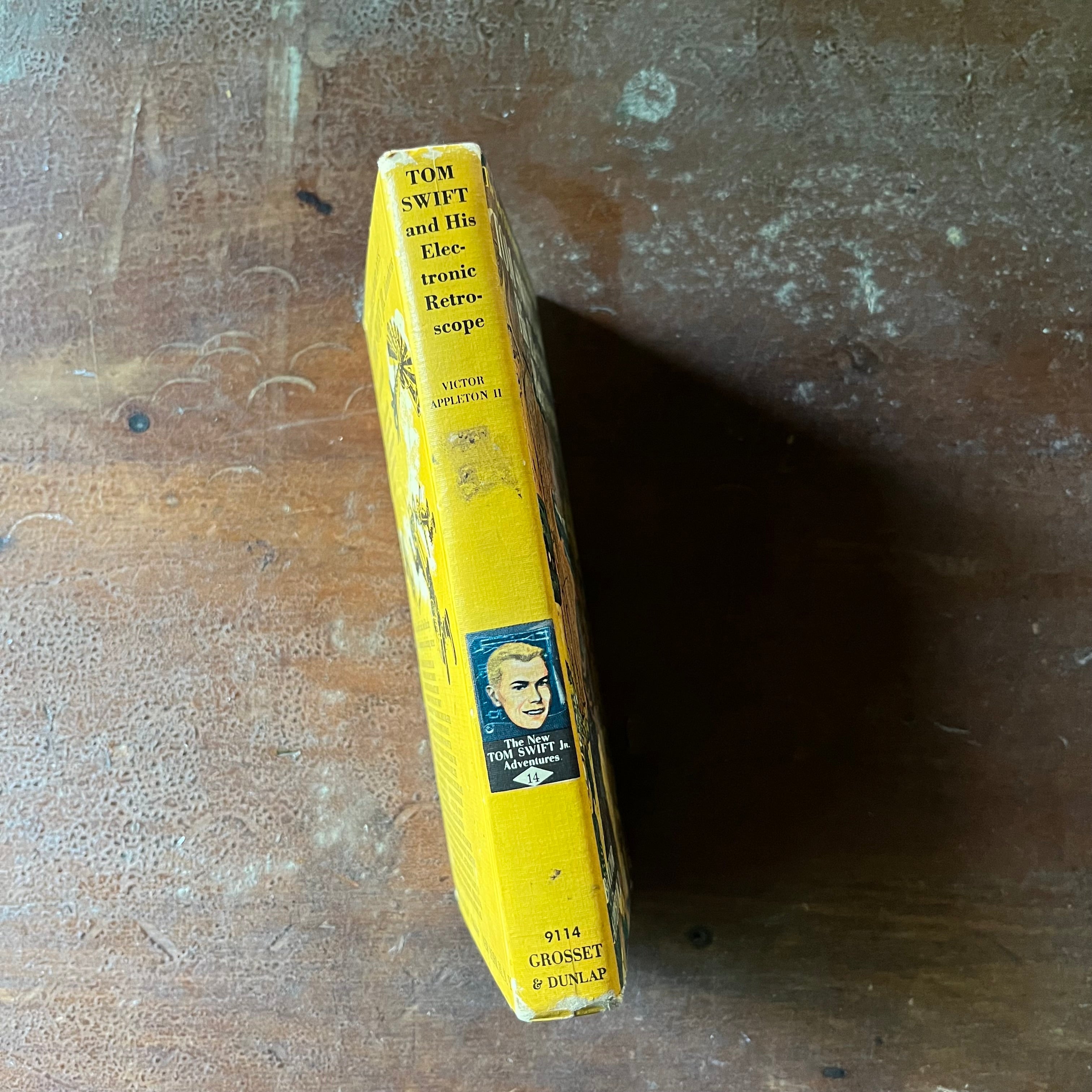 vintage children's chapter books, vintage adventure books for boys, homeschool library, The New Tom Swift Jr. Adventures Book - Tom Swift and His Electronic Retroscope written by Victor Appleton II with illustrations by Graham Kaye - view of the spine