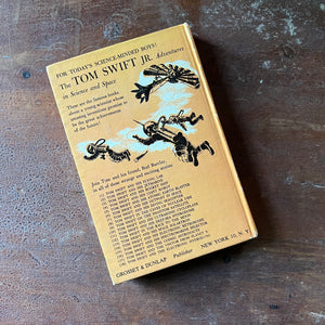 vintage children's chapter book, vintage adventure book for boys, homeschool library, The New Tom Swift, Jr. Adventures Book - Tom Swift and His Triphibian Atomicar written by Victor Appleton II with illustrations by Charles Brey - view of the back cover listing books in this series