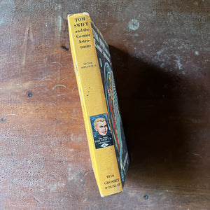 vintage children's chapter book, vintage boy's adventure story, homeschool library, The New Tom Swift Jr. Adventures Book #16 - Tom Swift and the Cosmic Astronauts written by Victor Appleton II with Illustrations by Graham Kaye - view of the spine