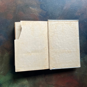 Uncle Tom’s Cabin written by Harriet Beecher Stowe-1907 Henry Altemus Petit Trianon Edition-classic American Literature-view of the back inside cover pages - there is a chunk torn from the page noted - that page is intentionally blank and no text is missing from this edition
