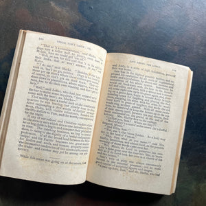 Uncle Tom’s Cabin written by Harriet Beecher Stowe-1907 Henry Altemus Petit Trianon Edition-classic American Literature-view of the inside content pages - note the foxing (age spots)
