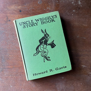vintage children's storybook, antique children's book - Uncle Wiggily's Story Book written by Howard R. Garis with illustrations by Lansing Campbell - view of the embossed front cover with an illustration of Uncle Wiggily in black on a green background