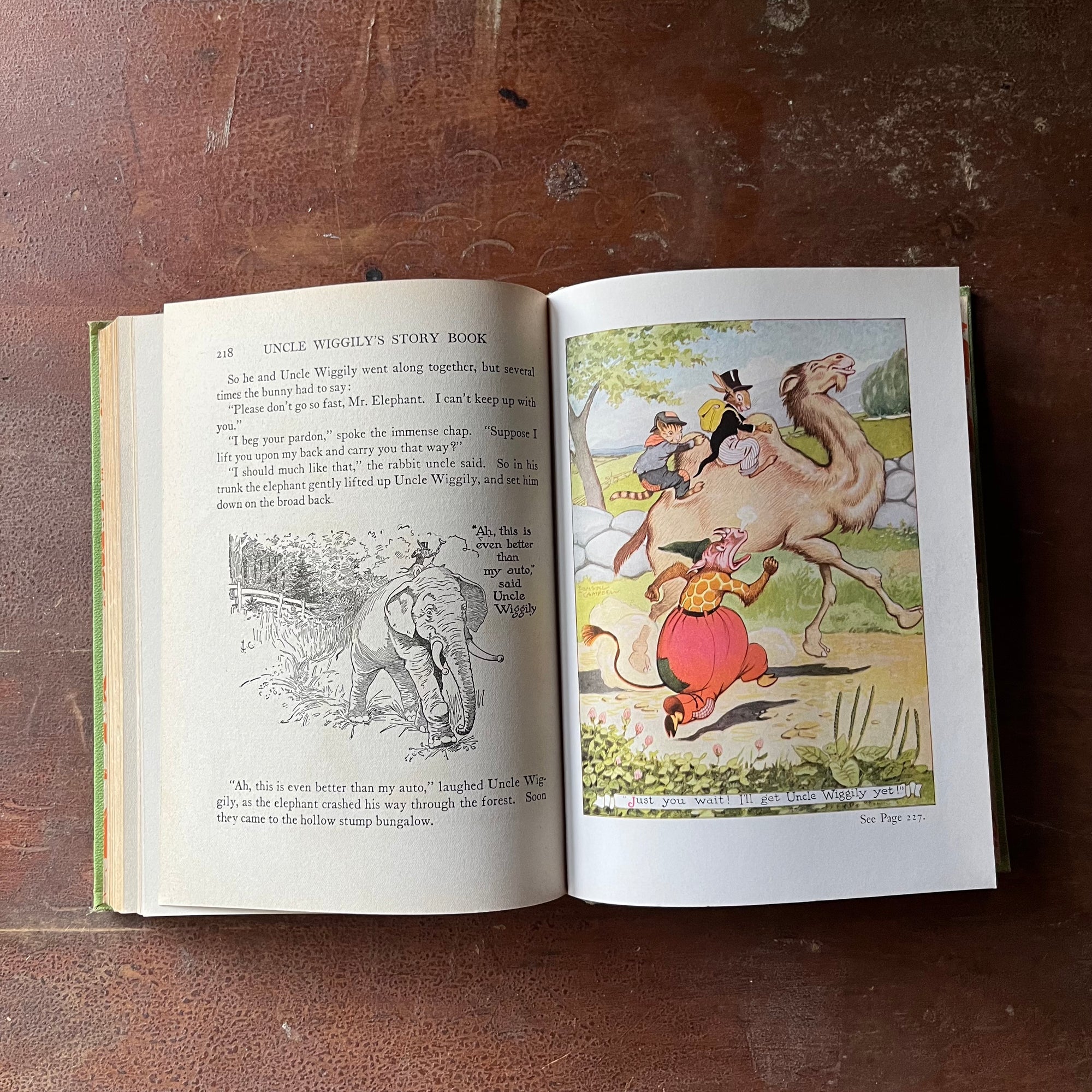 vintage children's storybook, antique children's book - Uncle Wiggily's Story Book written by Howard R. Garis with illustrations by Lansing Campbell - view of a full-page, full color illustration from one of the stories featuring two animals riding a camel with another animal running beside it
