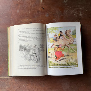 vintage children's storybook, antique children's book - Uncle Wiggily's Story Book written by Howard R. Garis with illustrations by Lansing Campbell - view of a full-page, full color illustration from one of the stories featuring two animals riding a camel with another animal running beside it