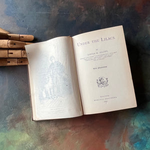 Under the Lilacs written by Louisa May Alcott-antique children's book-antique book-Robert Brothers 1896-view of the title page