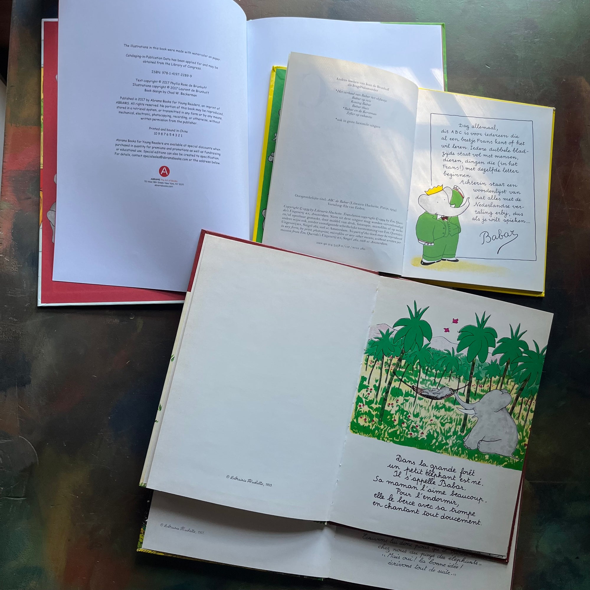 Vintage Babar Books-Four-Book French & Paris Collection by Jean de Brunhoff-Babar's Guide to Paris by Laurent De Brunhoff-Jean De Brunhoff ABC Van Babar (Dutch book)-Histoire de Babar-Babar et le Pere Noel-vintage picture books-foreign languages-view of the copyrights