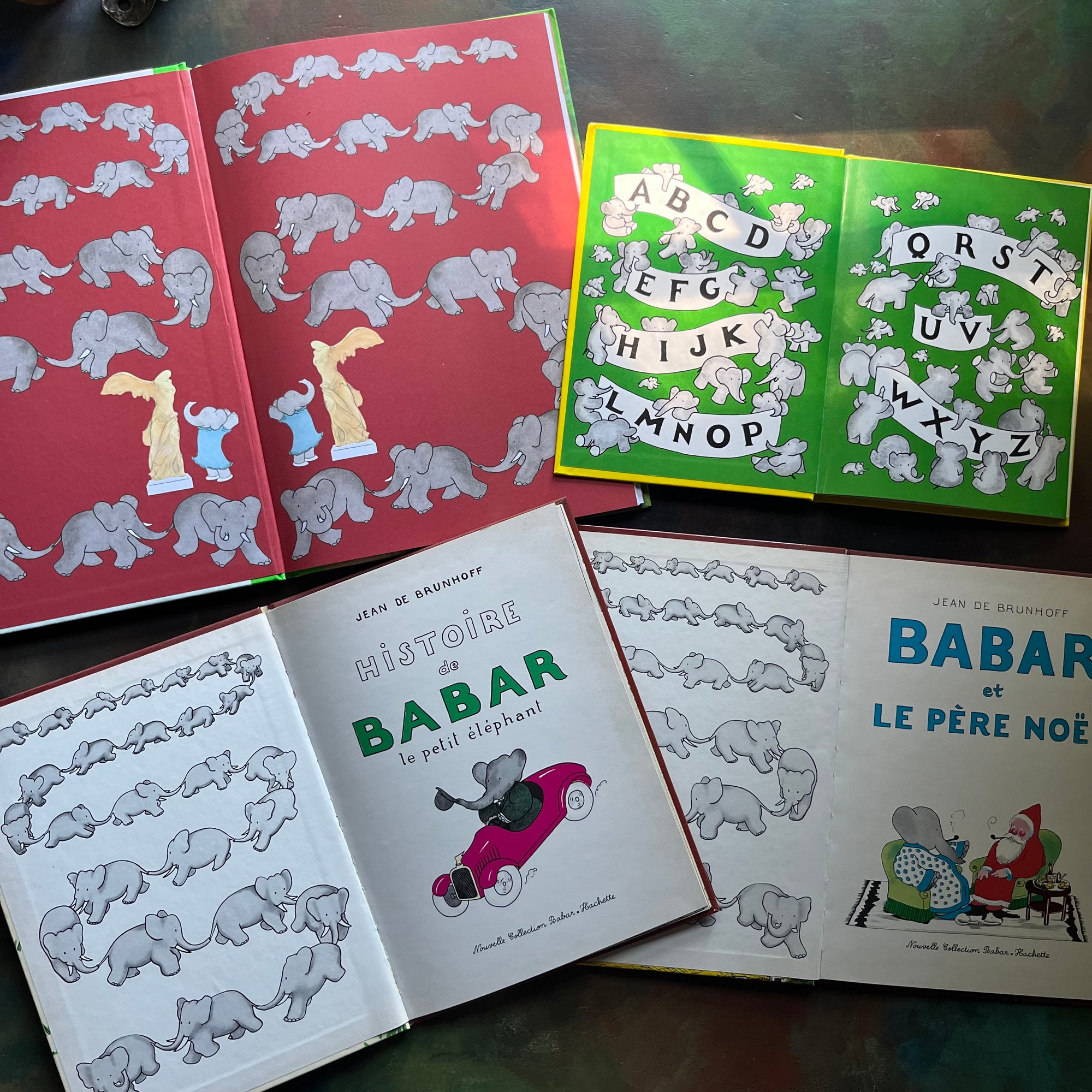 Vintage Babar Books-Four-Book French & Paris Collection by Jean de Brunhoff-Babar's Guide to Paris by Laurent De Brunhoff-Jean De Brunhoff ABC Van Babar (Dutch book)-Histoire de Babar-Babar et le Pere Noel-vintage picture books-foreign languages-view of the inside covers