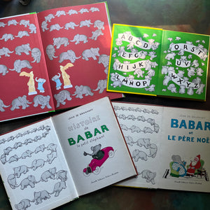 Vintage Babar Books-Four-Book French & Paris Collection by Jean de Brunhoff-Babar's Guide to Paris by Laurent De Brunhoff-Jean De Brunhoff ABC Van Babar (Dutch book)-Histoire de Babar-Babar et le Pere Noel-vintage picture books-foreign languages-view of the inside covers