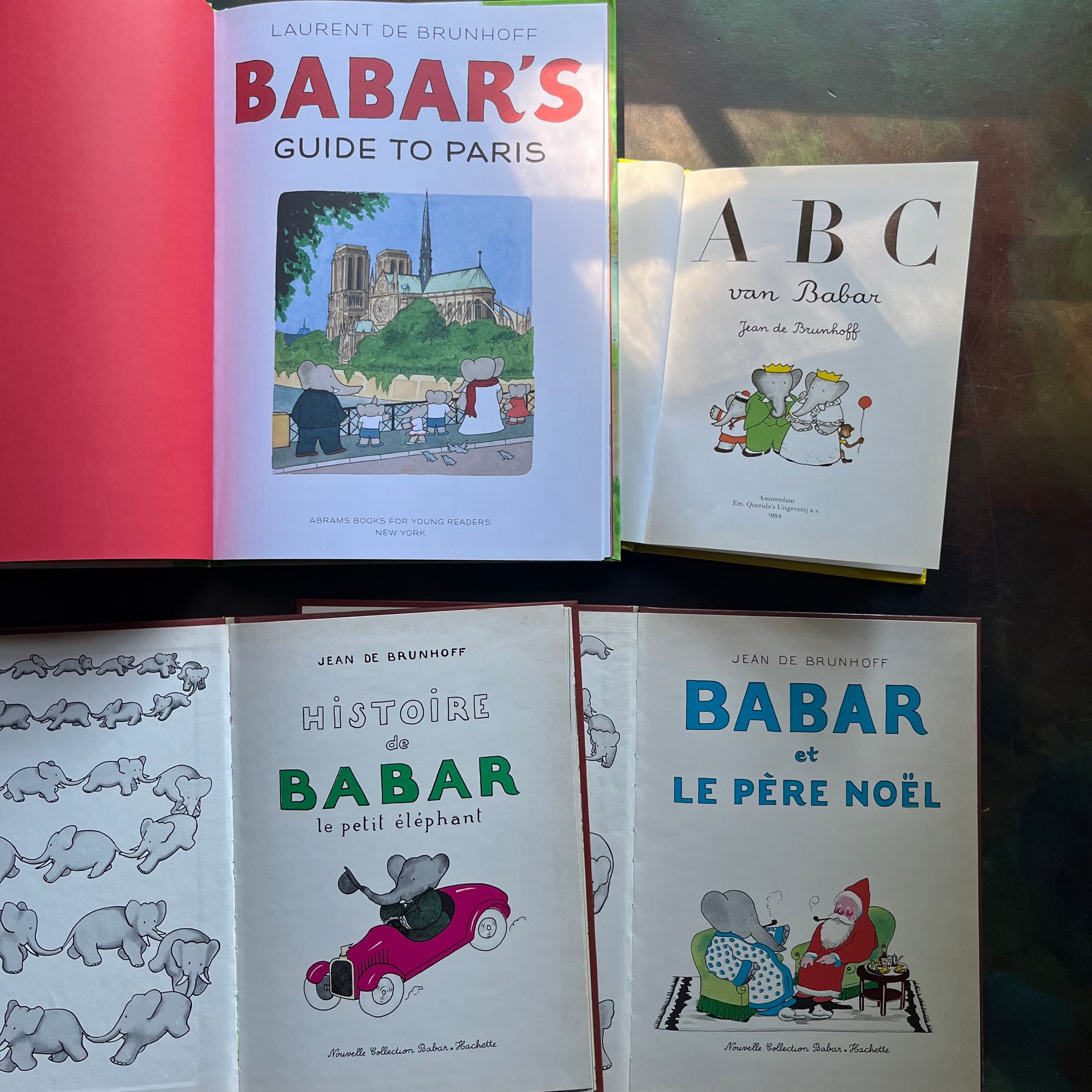 Vintage Babar Books-Four-Book French & Paris Collection by Jean de Brunhoff-Babar's Guide to Paris by Laurent De Brunhoff-Jean De Brunhoff ABC Van Babar (Dutch book)-Histoire de Babar-Babar et le Pere Noel-vintage picture books-foreign languages-view of the title pages
