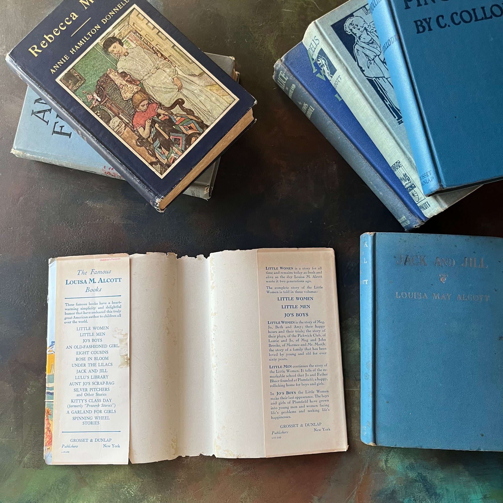Vintage Blue Book Stack-classic children's literature-Alice in Wonderland-Pinocchio-Jack & Jill-Fidelis-Ann's Family-view of the spines-view of the dust jacket's inside flaps