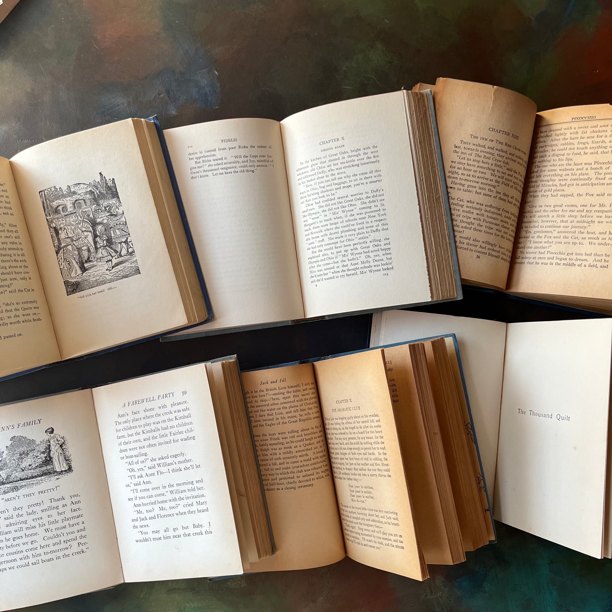 Vintage Blue Book Stack-classic children's literature-Alice in Wonderland-Pinocchio-Jack & Jill-Fidelis-Ann's Family-view of the spines-view of the illustrations & inside content
