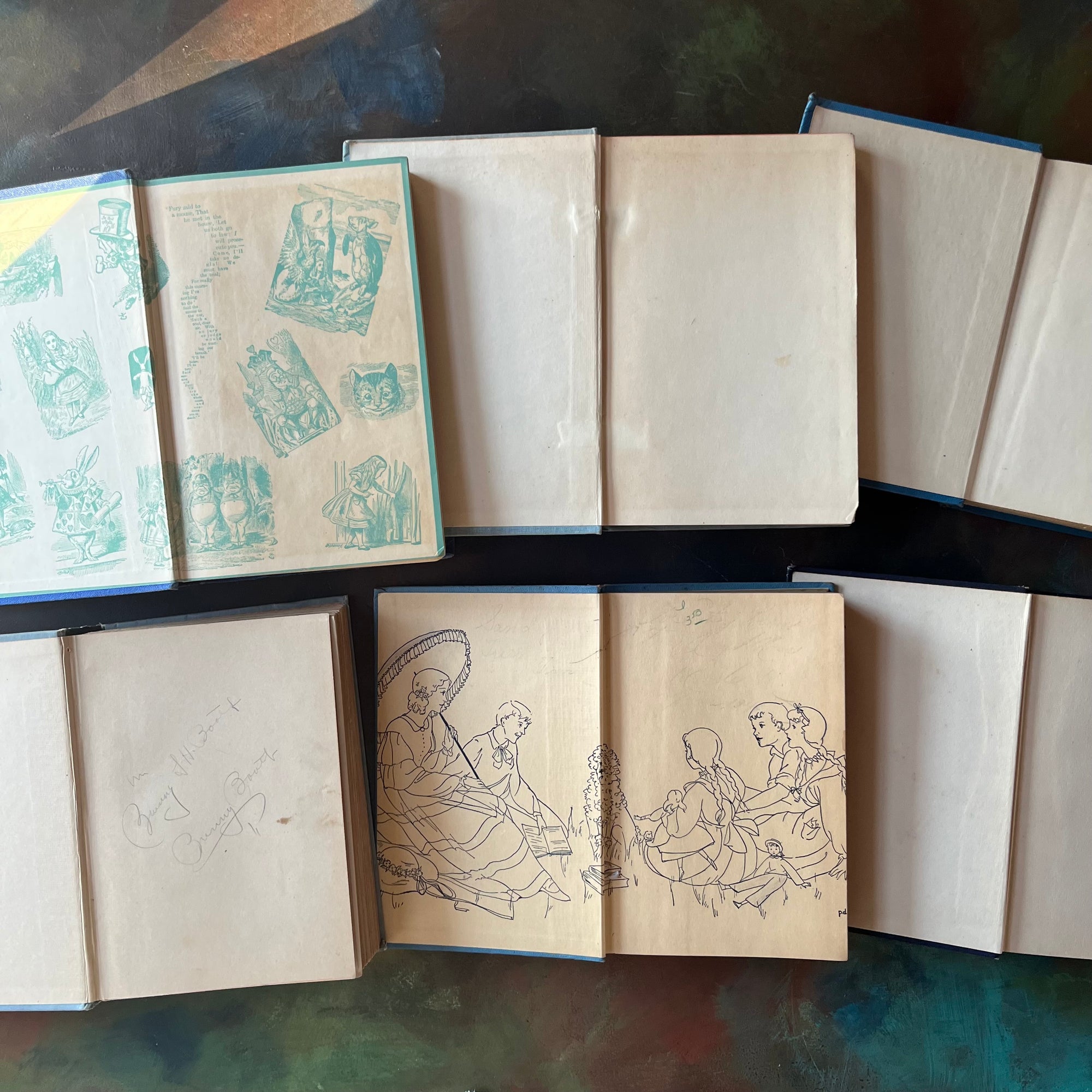 Vintage Blue Book Stack-classic children's literature-Alice in Wonderland-Pinocchio-Jack & Jill-Fidelis-Ann's Family-view of the spines-view of the inside covers