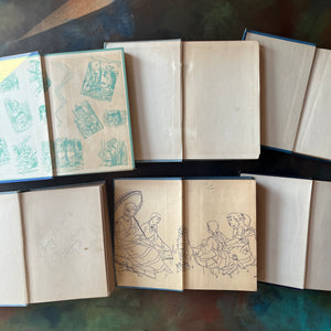 Vintage Blue Book Stack-classic children's literature-Alice in Wonderland-Pinocchio-Jack & Jill-Fidelis-Ann's Family-view of the spines-view of the inside covers