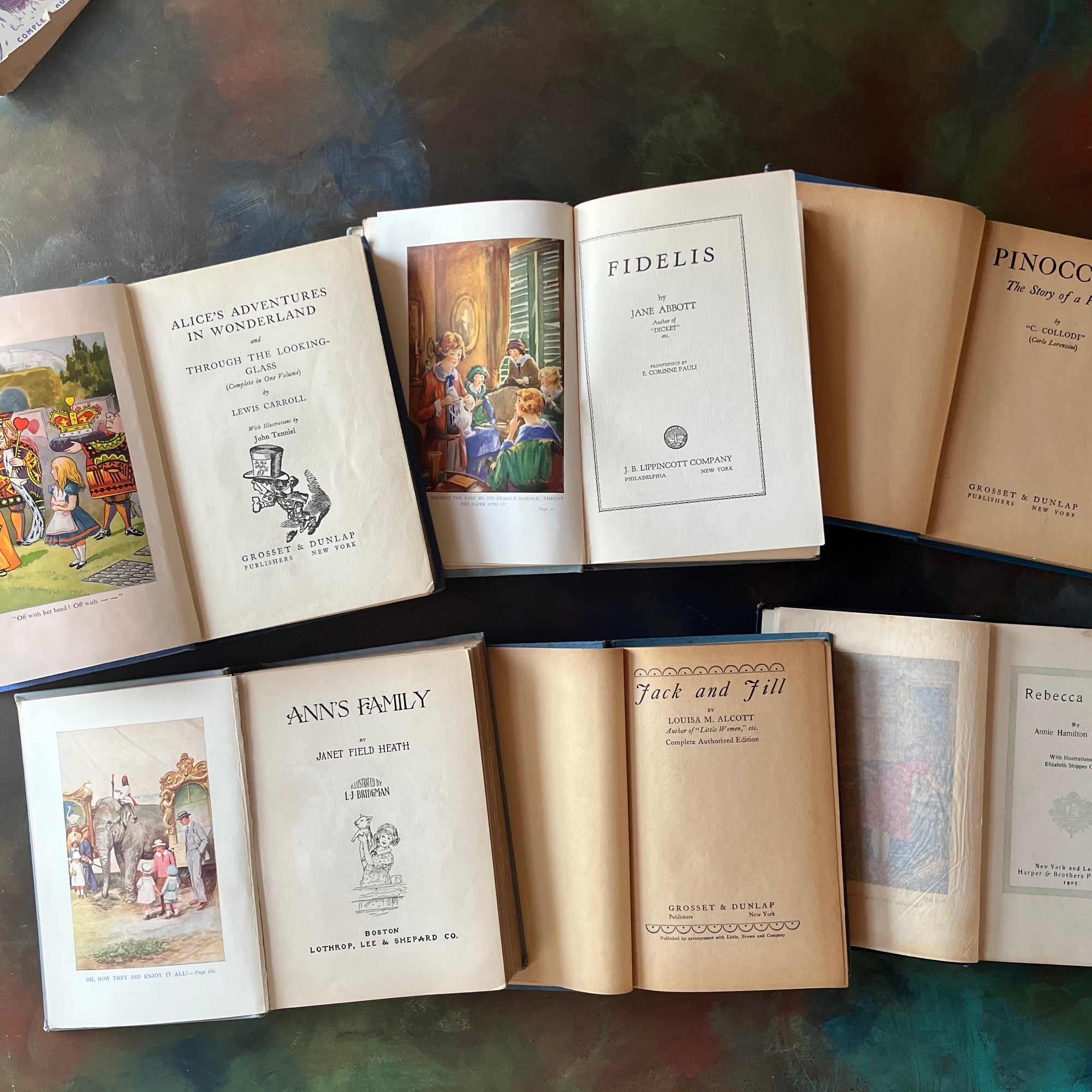 Vintage Blue Book Stack-classic children's literature-Alice in Wonderland-Pinocchio-Jack & Jill-Fidelis-Ann's Family-view of the spines-view of the title pages
