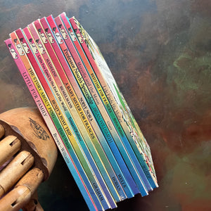 A collection of 11 Vintage Classic Children’s Picture Books published by the Children’s Choice Book Club-award winning picture books-view of their spines