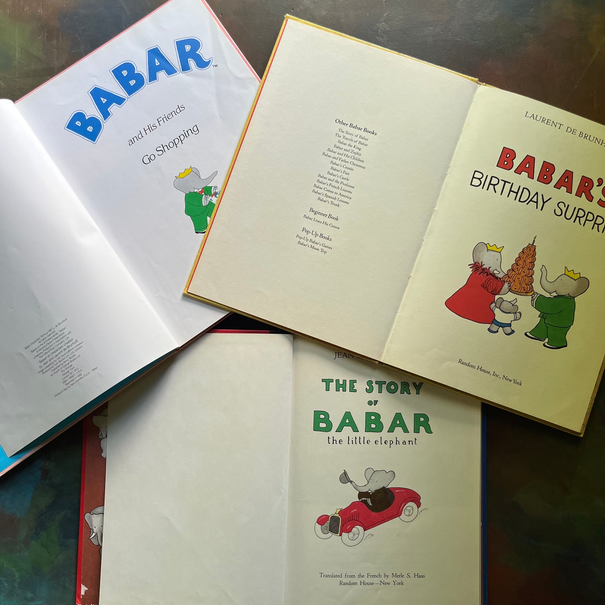Vintage Picture books written by Jean and Laurent de Brunhoff Books-The Story of Babar The Little Elephant-Babar's Birthday Surprise-Babar and His Friends Go Shopping-vintage children's picture books-view of the title & copyright pages