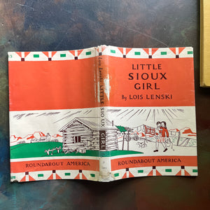 Vintage Lois Lenski Roundabout America Series Books-written and illustrated by Lois Lenski-We Live by the River-Little Sioux Girl-America250-1950s children's literature-living books-living history books-view of the outside of the dust jacket for Little Sioux Girl - note the damage at the spine where white paper has been added on the back