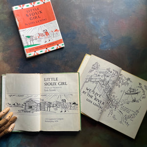 Vintage Lois Lenski Roundabout America Series Books-written and illustrated by Lois Lenski-We Live by the River-Little Sioux Girl-America250-1950s children's literature-living books-living history books-view of the title pages