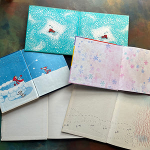 Vintage Children's Picture Books with a winter them-Snow, Katy and the Big Snow-The Snowy Day-Three Friends Find Spring-The Runaway Giant-view of the inside covers