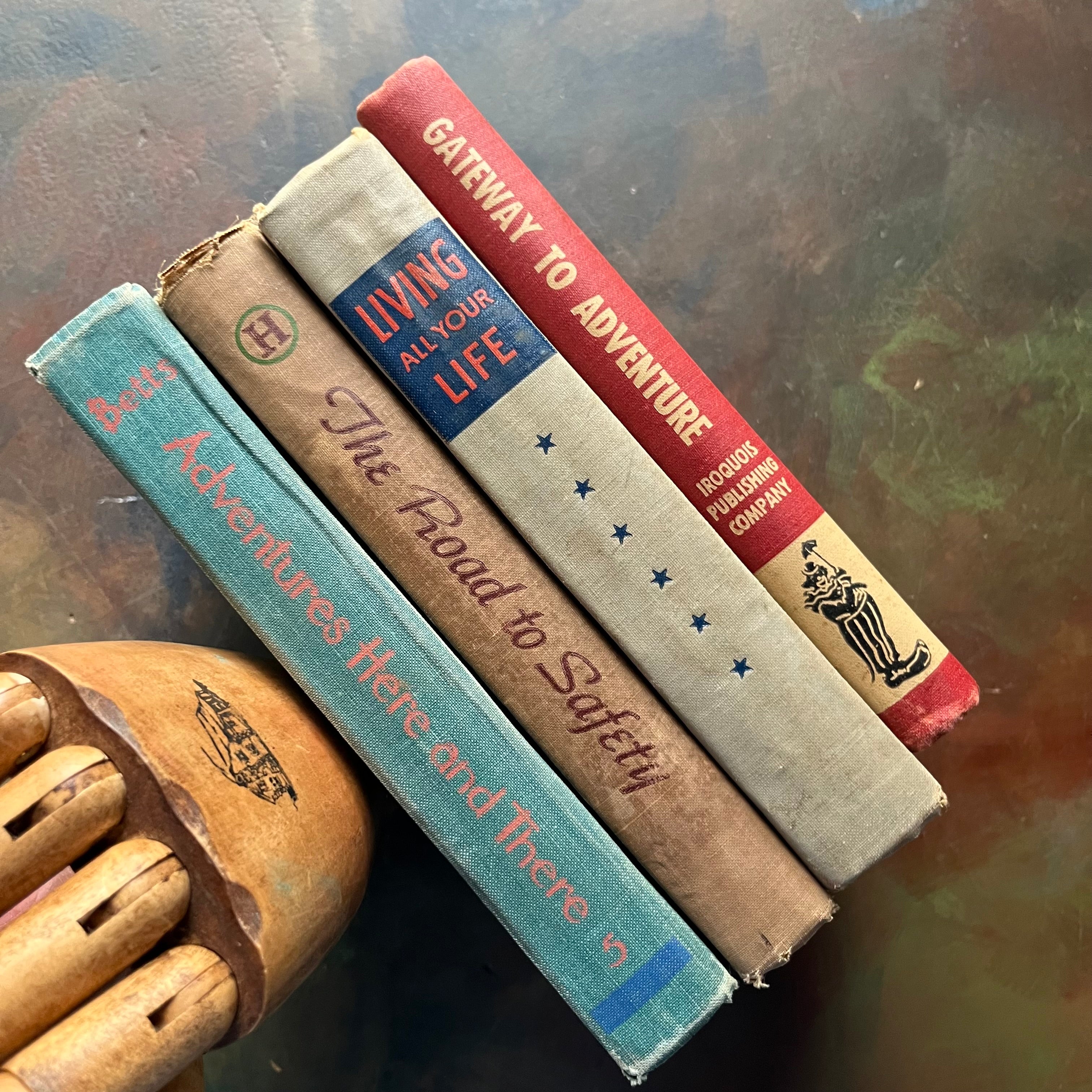 Vintage School Readers Set B-Learning to Read Books-Adventures Here and There-Who Travels There-Living All Your Life-Gateway to Adventure-Homeschool & Classroom Basic Readers-view of the spines