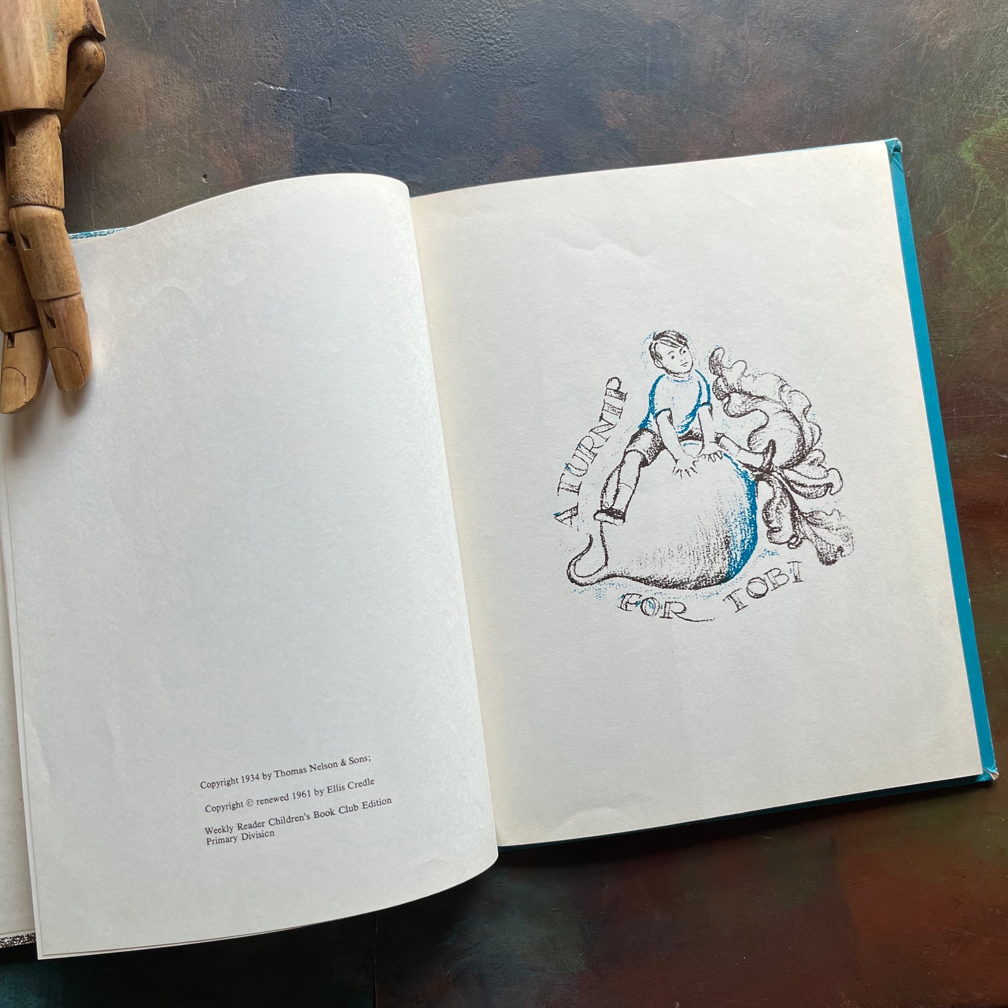 Vintage children's picture book-Down Down The Mountain written and illustrated by Ellis Credle - A Weekly Reader Children's Book Club Edition-view of the copyright page