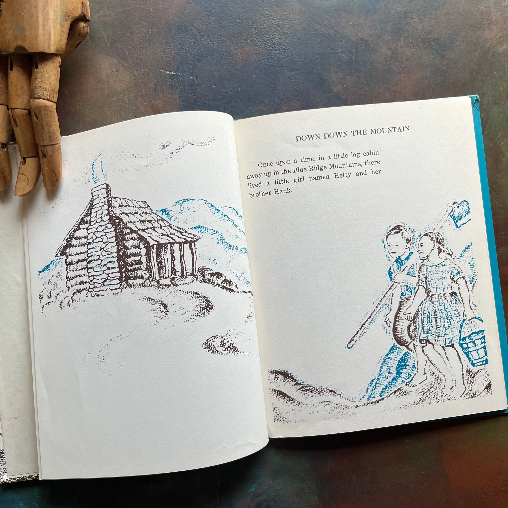 Vintage children's picture book-Down Down The Mountain written and illustrated by Ellis Credle - A Weekly Reader Children's Book Club Edition-view of the illustrations