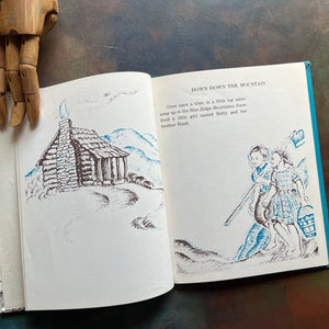 Vintage children's picture book-Down Down The Mountain written and illustrated by Ellis Credle - A Weekly Reader Children's Book Club Edition-view of the illustrations