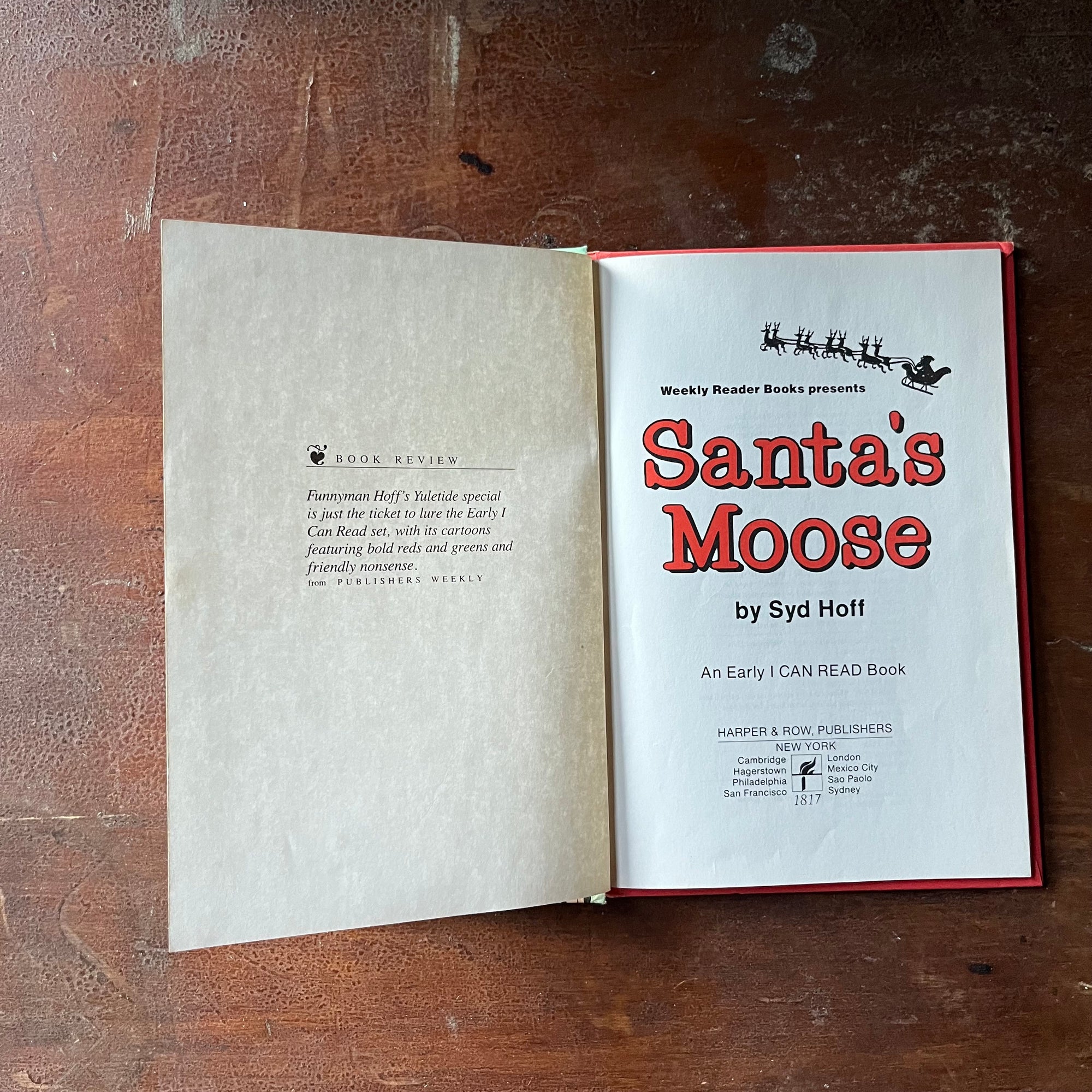 vintage children's picture book - Weekly Reader Books Presents Santa Moose, An Early I Can Read Book written & illustrated by Syd Hoff - view of the title page