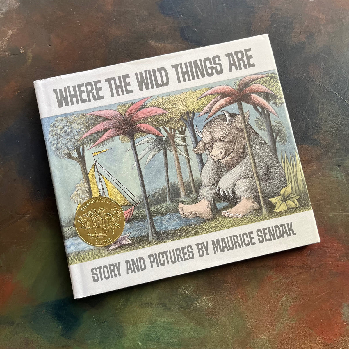 Where The Wild Things Are written and illustrated by Maurice Sendak-50th anniversary edition-2013-caldecott award-winning picture book-view of the dust jacket's front cover